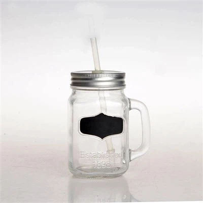 Mason-purkki kahvalla ja kannella ja oljella